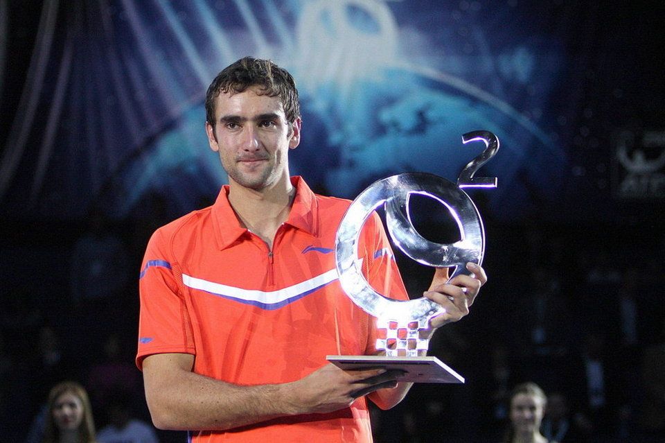 Torneos ganados. Matrin-Cilic-con-el-trofeo-de-_54366580336_54115221152_960_640_zps145bafc4