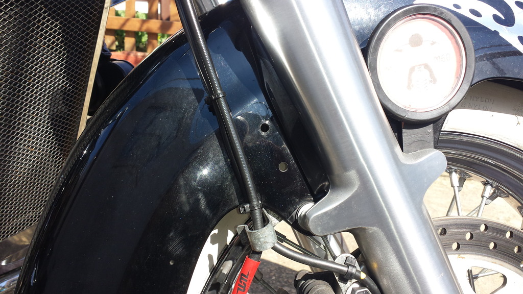 Moved the Helmet Lock to Front Mud-Guard 20150418_144536_zpsh3r26o9b