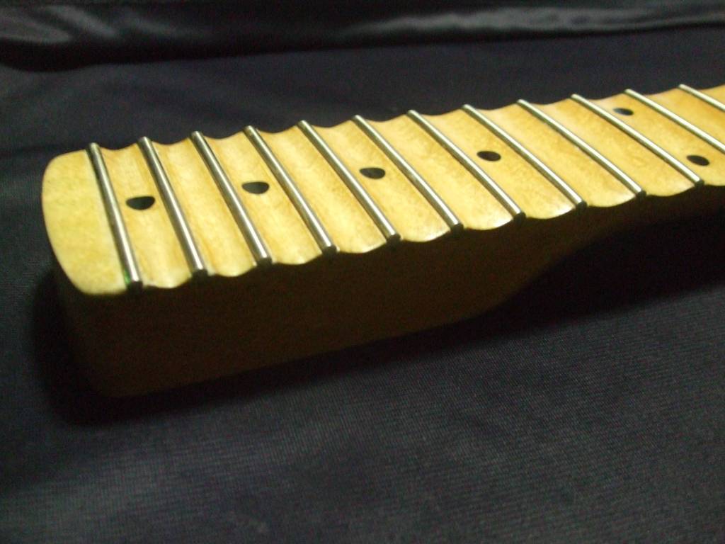 Guitarras escalopadas