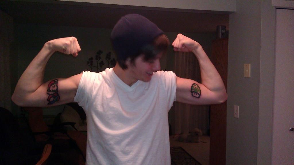 My new tattoos!!!  Check em out!  WARNING: True gamers only IMAG0289