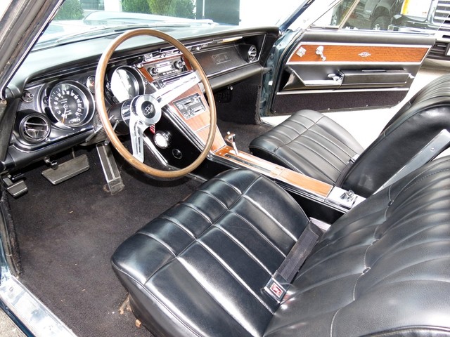 Belle Buick Riviera GS 1965 sur Ebay... T2eC16VcE9s4PtnFlBQZNpJmw_4