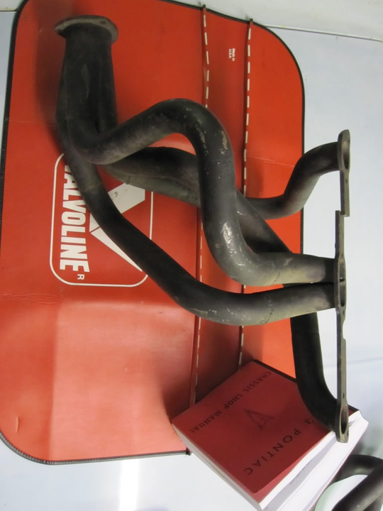 Check out what I scored! Headers!!!! Pontiac59fenderwellheadersterryspidel003