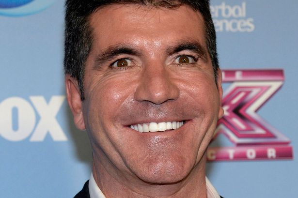 Post a funny picture here - Page 6 Simon-Cowell