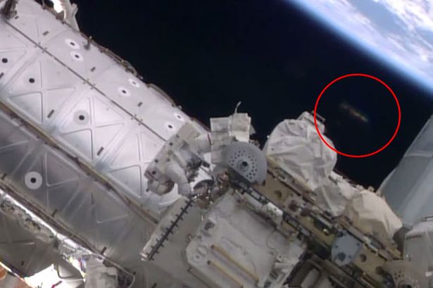 UFO riddle as mystery 'craft' appears to watch astronauts on International Space Station TEASER-UFO-spotted-watchin-atronauts