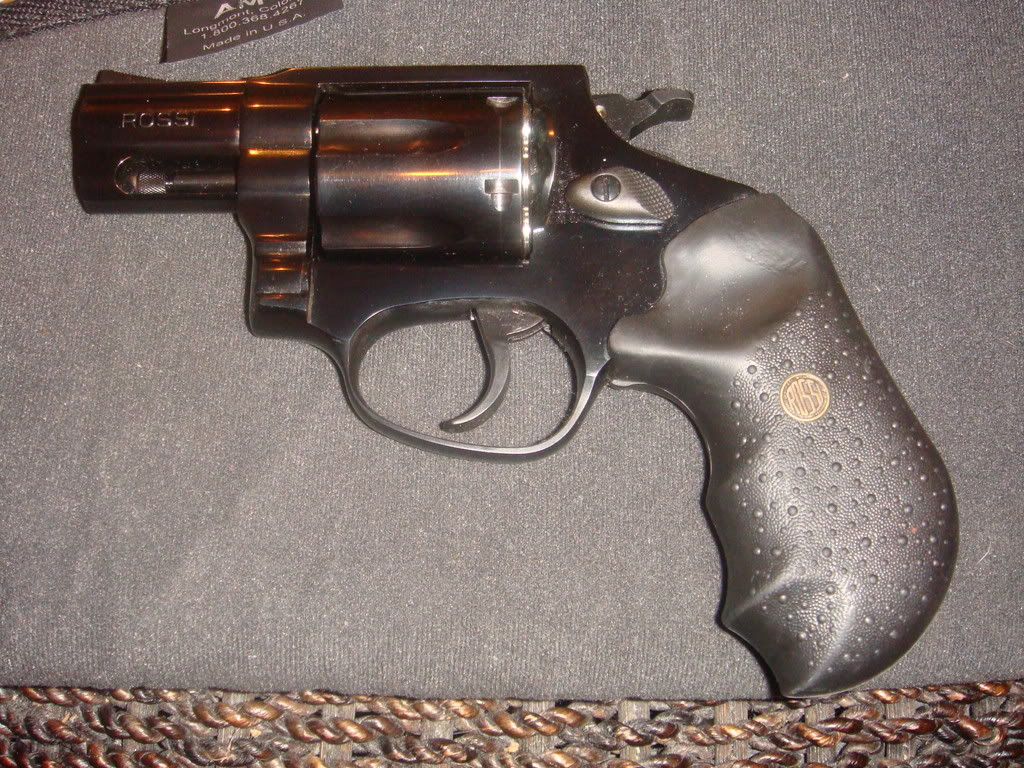 I will break down my recent carry guns by post Rossi .357 snub DSC01123