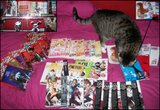 Fotos de nuestras colecciones de Mangas, gashas, etc. Th_Our_manga_collection_by_Smellerbee