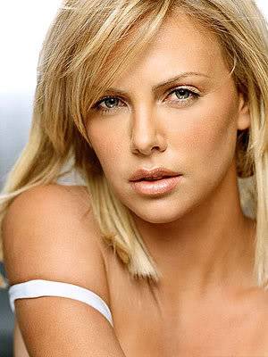 Plavuse ili crnke?Vecita dilema..... Charlize_theron1_300_400