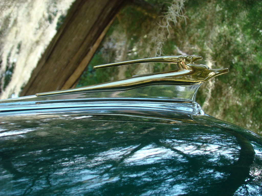 I'm looking for a rat-roddish, surferish, old schoolish hood ornament idea. Chevy-impala-hood-ornament