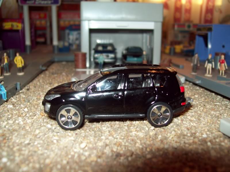 Novedades de mi colección Majorette (Peugeot 4007 y Citroen C Crosser) 000_0002-3