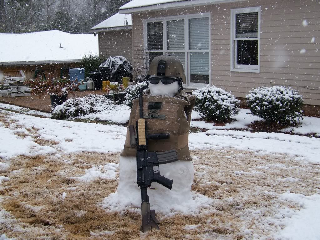 Snow is a rare occation LOL Sgt. Snowman March1Snow010