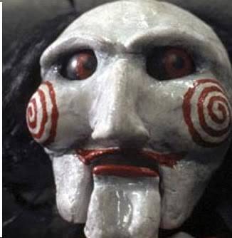 cual es tu pelicula de terror favorita Saw-puppet2
