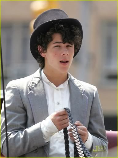 Nick new video Normal_nick-jonas-top-hat-horse-05