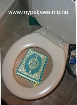 Quran Menantang, Kafir Menjawab Koran_in_toilet_flush_quran