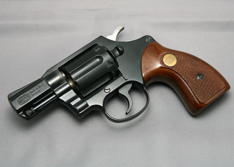 Can anybody tell me more about this blank firing revolver... Mauser