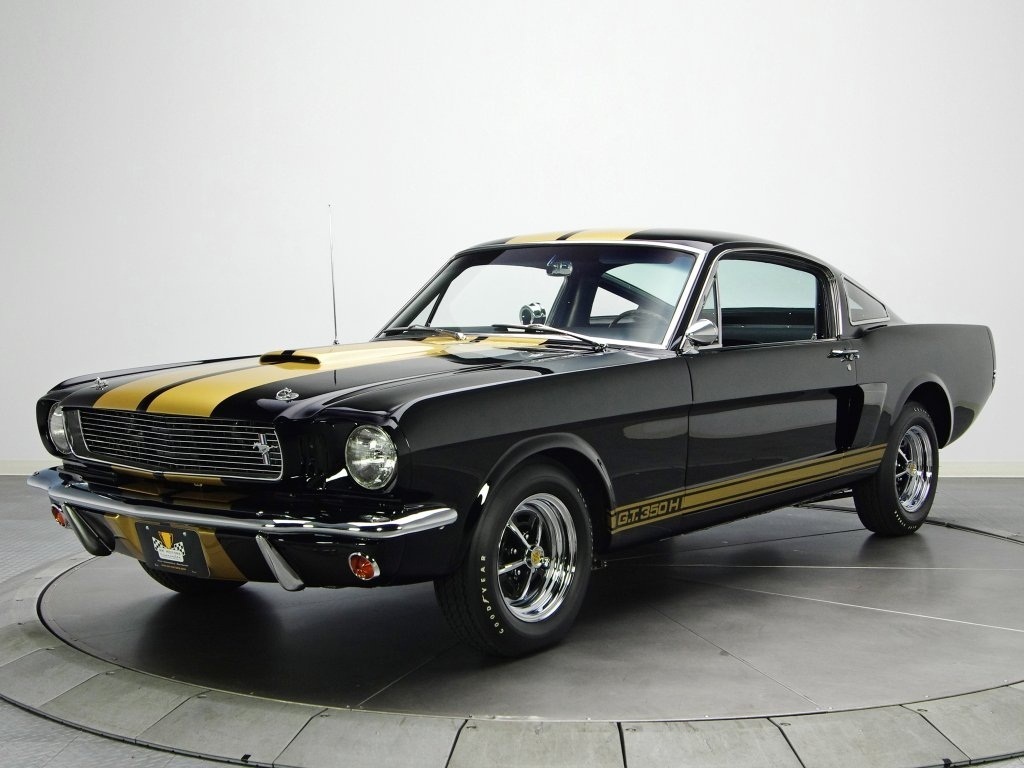 Referencia: Ford Mustang 1964 até 1972 1966%20Shelby%20GT%20350H%20Promotional%20Photo1%20none%20were%20delivered%20with%20aluminum%20wheels.%20They%20all%20had%20chrome%20Magnum%20500%20wheels_zpsil4u8ish