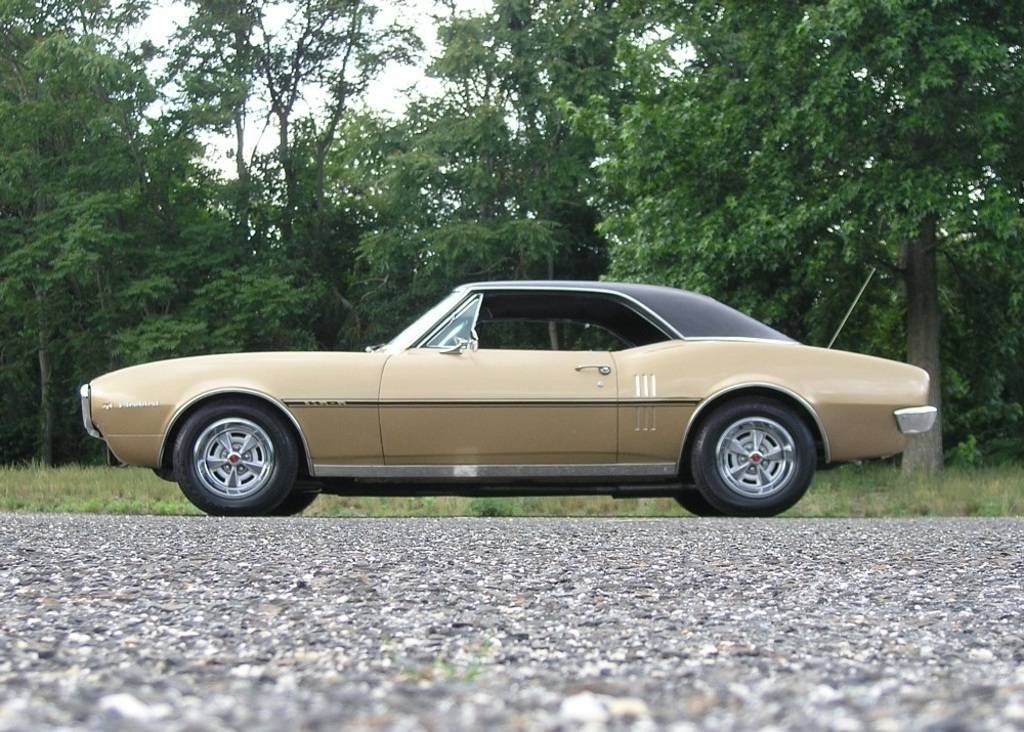 Referencia: Pontiac Firebird 1967%20Firebird%20H.O.%20with%20standard%20E70x14%20BSW%20tires_zpsuqxpvrz4