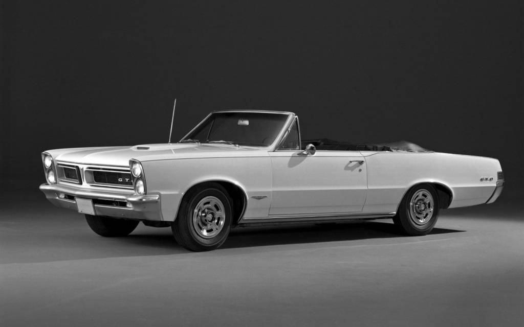 Referencia: Pontiac GTO 1965%20GTO%20Convertible%20Promotional%20Photo_zps1sgjv1n6