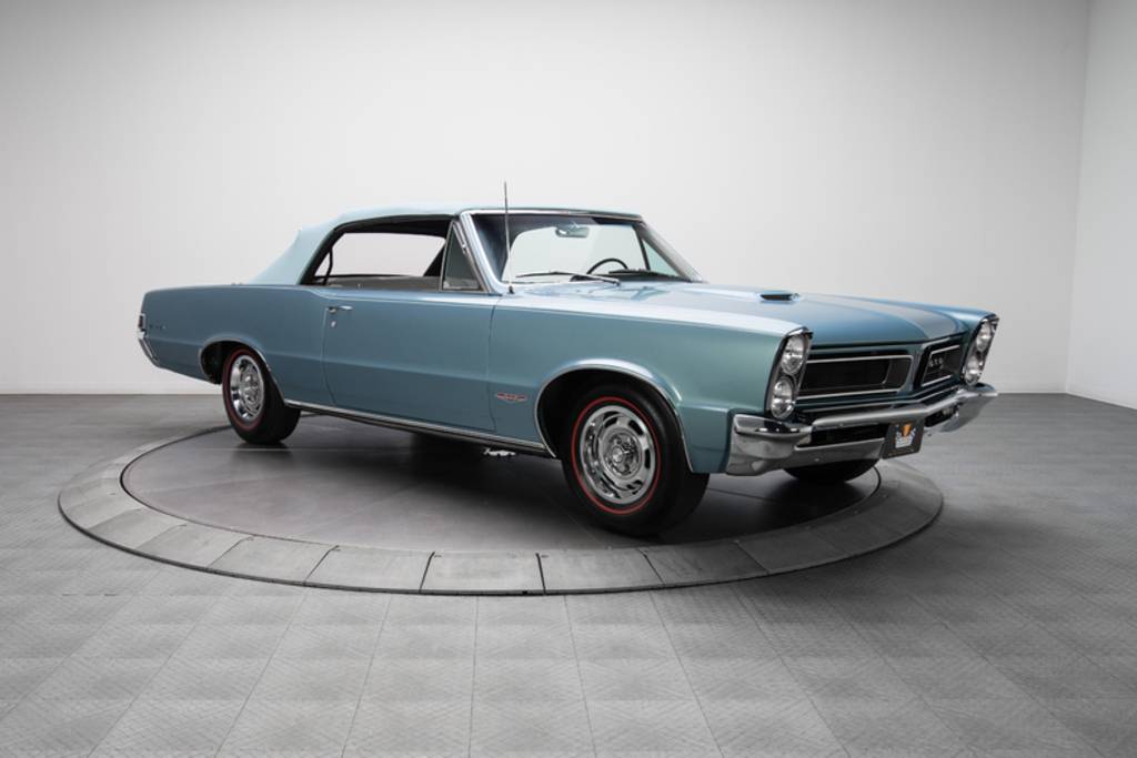 Referencia: Pontiac GTO 1965%20GTO%20Convertible%20with%20rare%20blue%20top_zpsyo0mn2wz