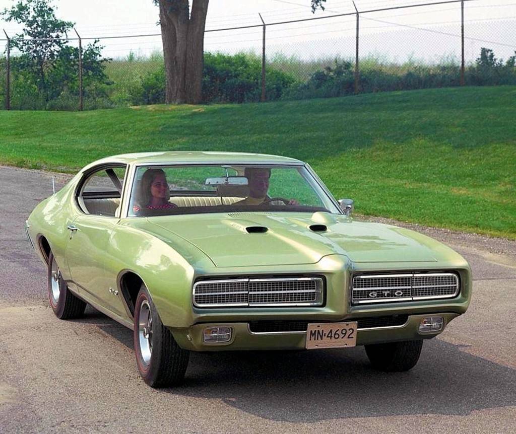 Referencia: Pontiac GTO 1969%20GTO%20Promotional%20Photo_zpssm0mwi9j