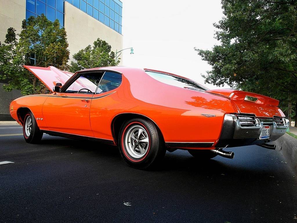 Referencia: Pontiac GTO 1969%20Judge%20with%20482N25%20Exhaust%20Tailpipe%20Extensions_zpsrruyshgt