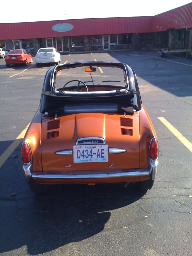 That lil orange car near the gas station A94fbe05