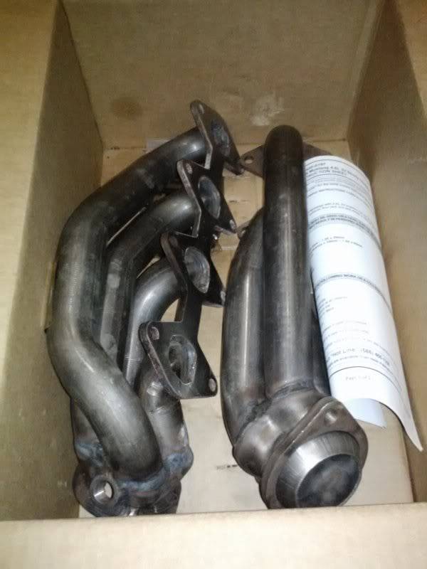 Mustang parts FS, headers, upper arms, throttle bodies CAM00501