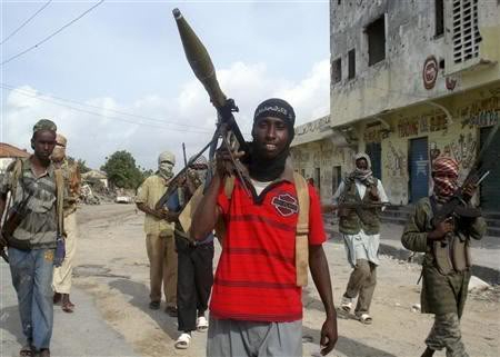 OP: BLACKHAWK - 06.25.11 - Page 5 17961-islamic-rebels-patrol-the-streets-of-mogadishu