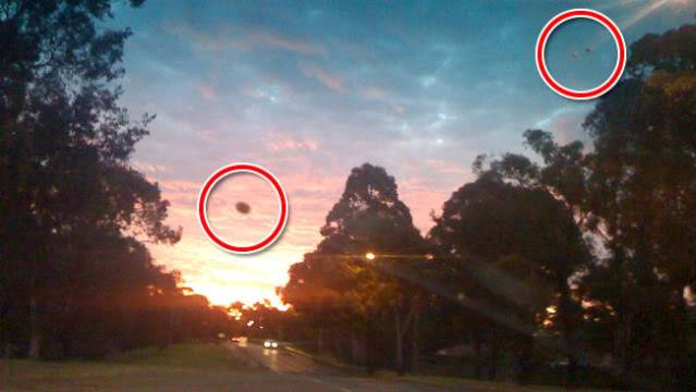 UFOs over Sydney -  Reunite you got pics??? Ufos-over-sydney