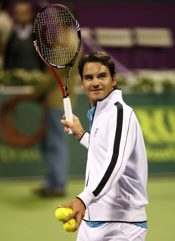 Votemos:¿Cual es la foto más sexy de Roger? - Página 3 Doha100105r32thrw02