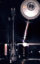 Vinyl record and stylus under the microscope   Unnamed_zpscb2e7076
