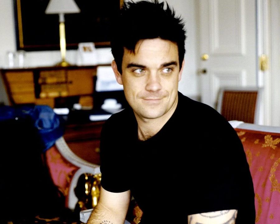 Platonic Love... Robbie_williams_winxp_wallpaper