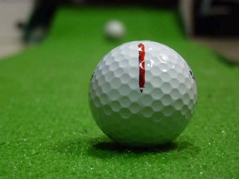 Do the alignment of dimples on e golf ball affect our putt? 8C153A10-D4E9-4B5E-97AD-3B7847B9E6FF-2318-000001BE8CA36F02