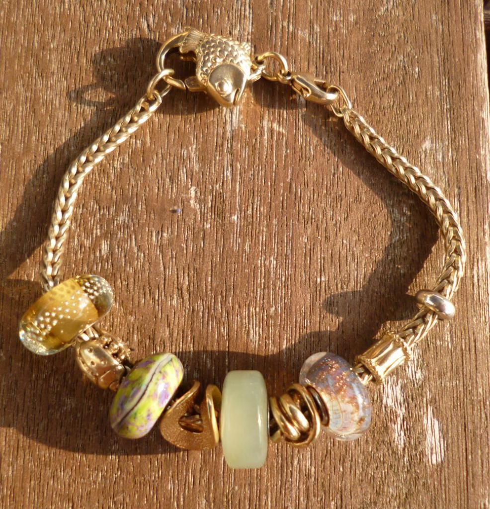 Gold, greens and purples Goldtrollstone_zpsff628ef5