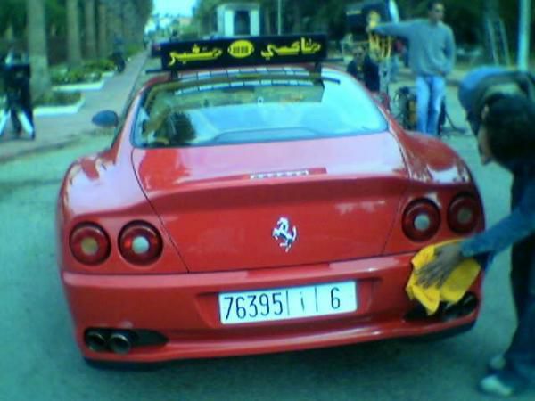 Jeu : suite des images - Page 2 Ferrarri-taxi