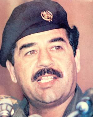 مشهد مثير .. رجال ملثمون .. وكلاب تعوي ..!! Saddam30