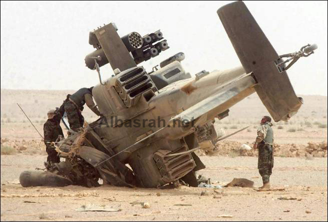 صور الرحلة الشيقة من امريكا الى العراق Downed-apache-helicopter