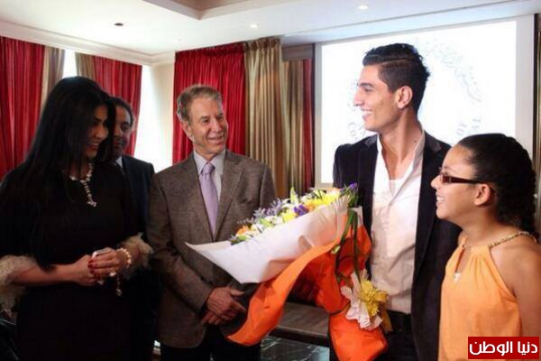 صور محمد عساف يشارك في علاج تجميلي لضحايا الحروب 2014 3910005453