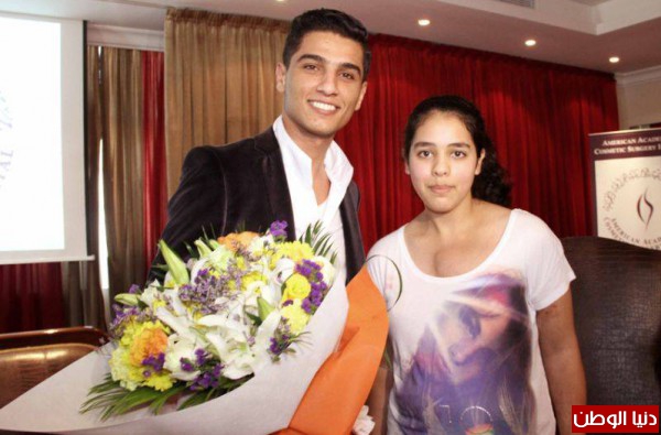 صور محمد عساف يشارك في علاج تجميلي لضحايا الحروب 2014 3910005458