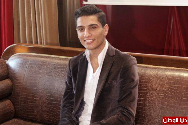 صور محمد عساف يشارك في علاج تجميلي لضحايا الحروب 2014 3910005463