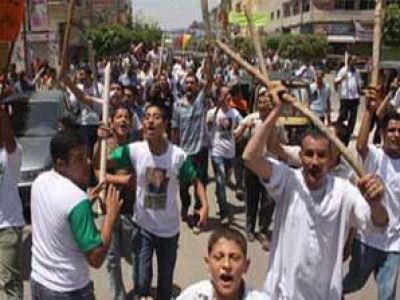 اشتباكات بالحجارة بين الموالين والمعارضين لمبارك في ميدان التحرير 3873939210
