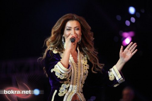 اتهام نوال الزغبي بإهانة العباءة المغربية بعد كشف بطنها 14