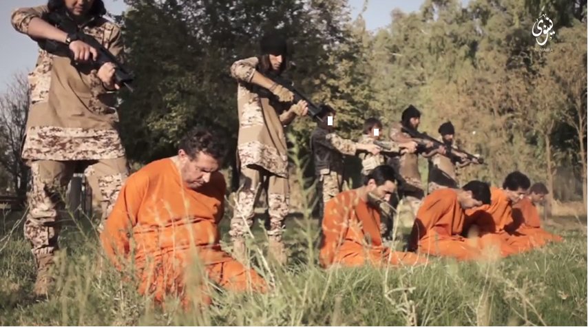بالصور: "داعش" يبث أكثر إصداراته دمويه! 1109427182
