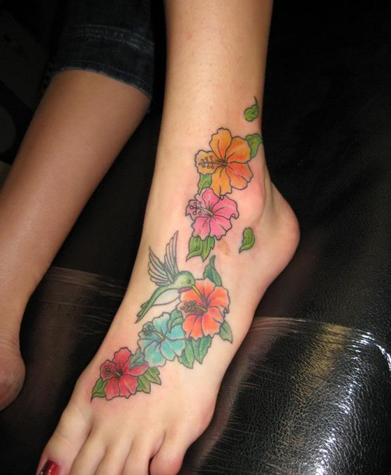 شابة بلجيكية مهددة ببتر سقها اثر "فيروس الوشم"!! صورة Flower-tattoo