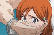 Orihime Inoue 190px-NnoitraHoldsOrihime