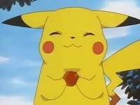 Equipación de objetos en los Pokémon EP039_Pikachu_comiendo_una_manzana
