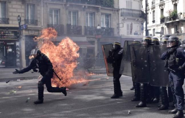 Chassez le naturel...... 648x415_six-policiers-blesses-dont-deux-grievement-lors-heurts-marge-manifestation-1er-mai-paris