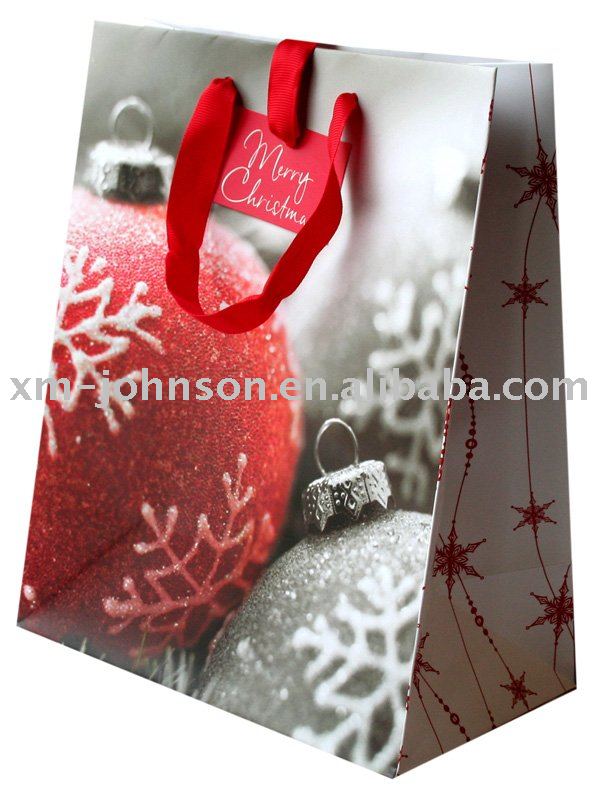 كبرتي وما زلتي في نظري صغيرة Christmas_gift_paper_bags