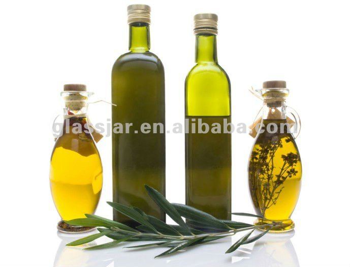 صورالسواك وزجاجات زيت الزيتون. Dark_green_olive_oil_bottle