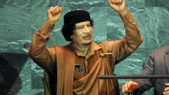 Ahmadinejad dans la controverse... AFP_090923mouammar_kadhafi_4