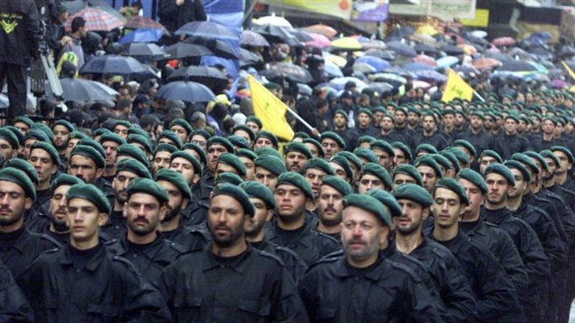 المبحث الأول: نشأة حزب الله وعقيدته AFP_130528_6g83k_rci-parade-hezbollah_sn635